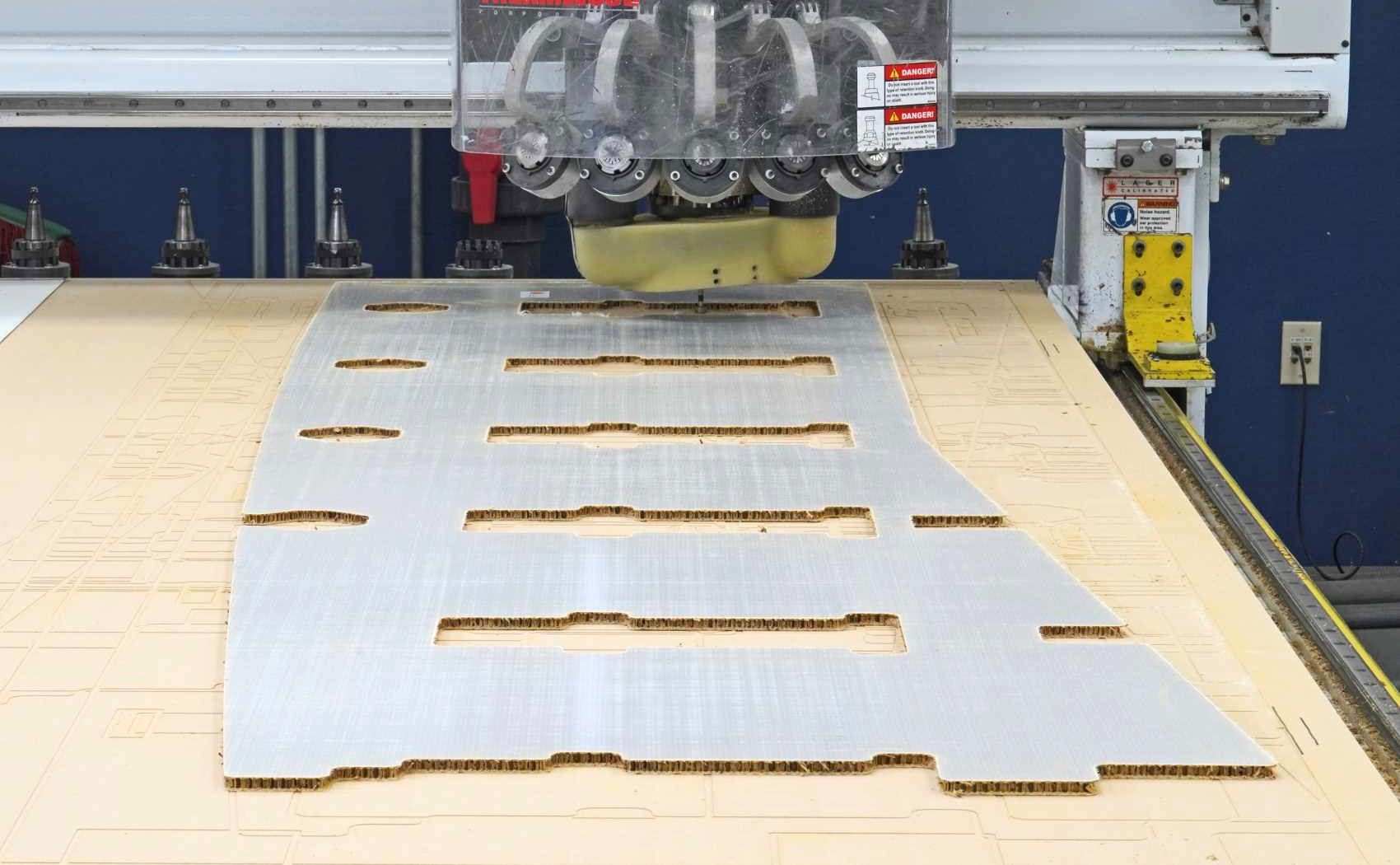 5-axis CNC machining a floor panel for an aircraft